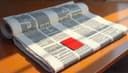 le cahier — section [of newspaper]