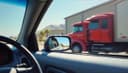 el espejo retrovisor — rearview mirror