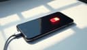 I need to charge my phone — Мне нужно зарядить телефон