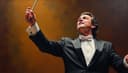 el director de orquesta — conductor